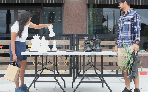 Two people playing chess