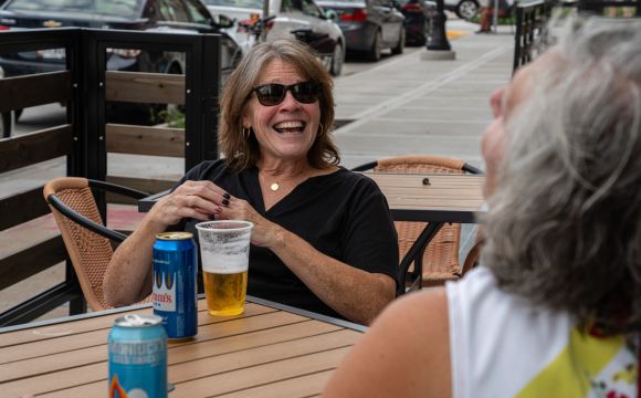 People enjoying sidewalk patio