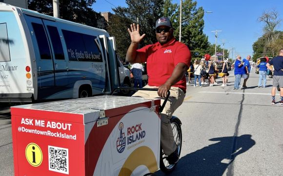 Ambassador with trike at a parade