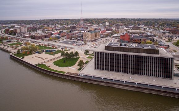 drone shot of professional services building - Modern Woodmen of America along the Mississippi River