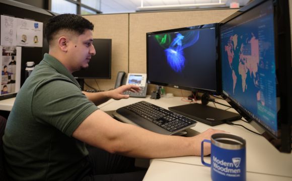 a professional working at their desk at Modern Woodmen