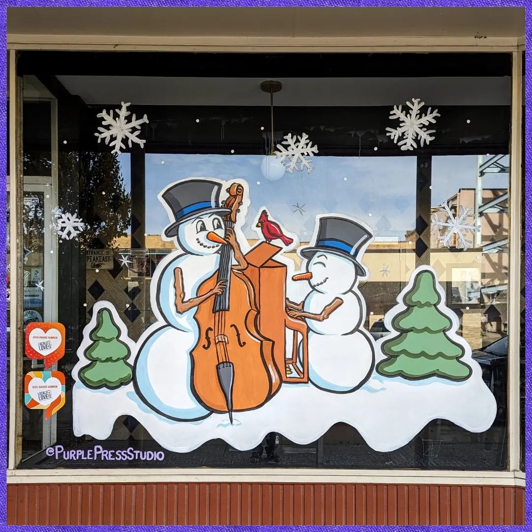 Jazzy snowmen adorn the front of The Speakeasy in this design from Ash Vandy.